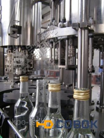 Фото Линия розлива минеральной воды в стеклянную бутылку 3в1