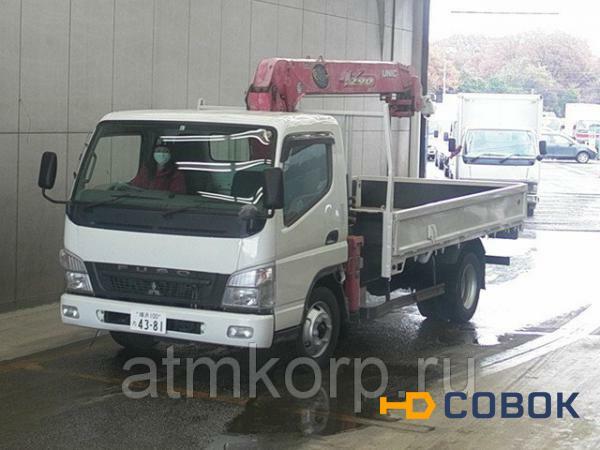 Фото Манипулятор бортовой MITSUBISHI CANTER кузов FE83DY гв 2011 груз 3,5 тн КМУ 3 тн стрела 12 м пробег 87 т.км