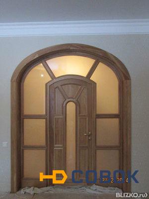 Фото Арочные межкомнатные двери из массива ясеня с багетом