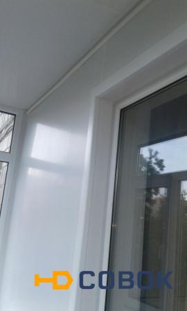 Фото Обшивка балконной стены с откосами на балконный блок.
