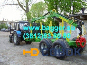 Фото Телега тракторная SVETEKA с манипулятором для погрузки и перевозки леса.