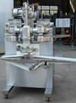 фото Автоматическая экструзионно-формующая машина для изделий с однослойной начинкой или без нее WL-YBAM