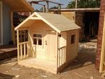 фото Детский деревянный игровой домик